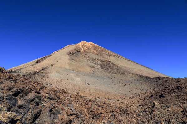 View of the impressive Mount Theide on Tenerife in its rocky surroundings. Picture Board by Michael Piepgras