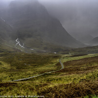 Buy canvas prints of Enigmatic Foggy Embrace of Glen Coe by Gilbert Hurree