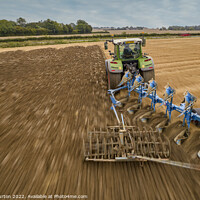 Buy canvas prints of Fendt Tractor Ploughing by Chris Gurton