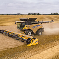 Buy canvas prints of New Holland Combine Harvester by Chris Gurton