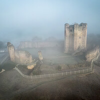 Buy canvas prints of Conisbrough Castle In The Fog by Apollo Aerial Photography