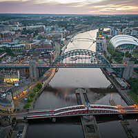 Buy canvas prints of Newcastle Bridges at Dawn by Apollo Aerial Photography