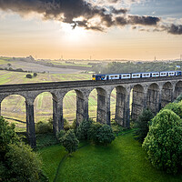 Buy canvas prints of Train Departing Penistone by Apollo Aerial Photography