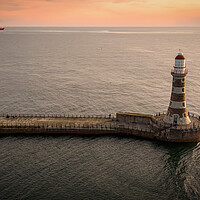 Buy canvas prints of Roker Pier Sunset by Apollo Aerial Photography