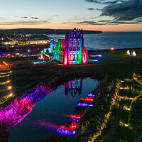 Buy canvas prints of Whitby Abbey Night Lights by Apollo Aerial Photography