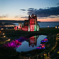 Buy canvas prints of Whitby Abbey Illuminations by Apollo Aerial Photography