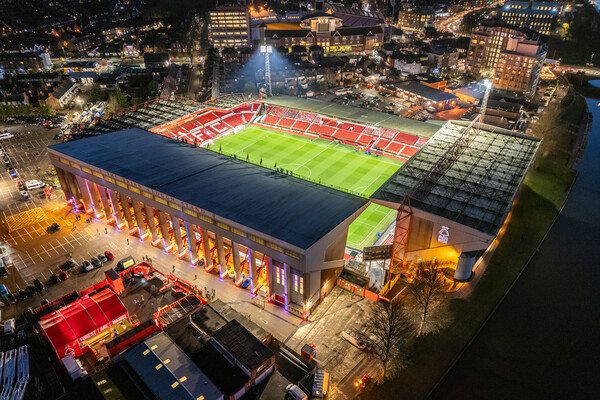 The City Ground Night Match Picture Board by Apollo Aerial Photography
