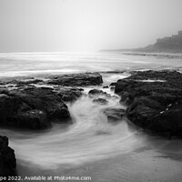 Buy canvas prints of Swirling Sea Under Bamburgh Castle by John-paul Phillippe