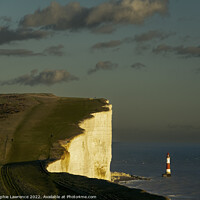 Buy canvas prints of Beachy Head lighthouse and cliff in sunshine by Sophie Lawrence