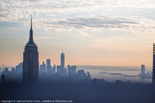 Empire State building at sunset from the Top of th Picture Board by Samuel Foster