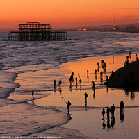 Buy canvas prints of Brighton beach at sunset by Millie Brand