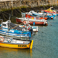 Buy canvas prints of Eleven Boats in Porthleven Harbour by Adrian Burgess