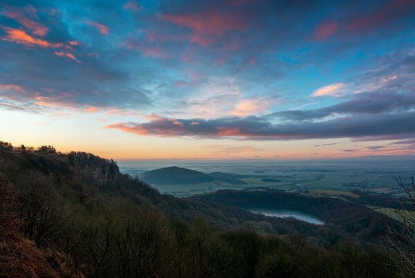 Sutton Bank colourful sky at sunrise Picture Board by Alan Wise
