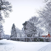 Buy canvas prints of Charming Red Brick House: Winter's Touch in the Sn by Stephen Young