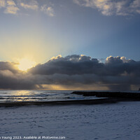 Buy canvas prints of Arctic Elegance: Icelandic Sunset Over Snowy Shore by Stephen Young