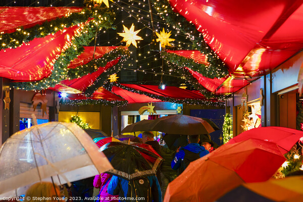 Cologne Christmas: Rain-kissed Umbrellas Picture Board by Stephen Young