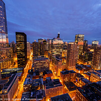 Buy canvas prints of Aerial Chicago skyscrapers illuminated at dusk Trump Tower  by Spotmatik 