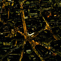 Buy canvas prints of Aerial illuminated London city the financial business center  by Spotmatik 