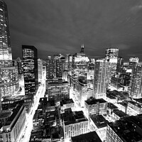 Buy canvas prints of Aerial Chicago skyscrapers illuminated at night  by Spotmatik 