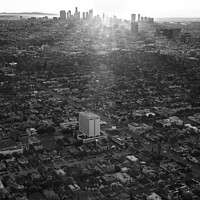 Buy canvas prints of Aerial skyline sunrise over Los Angeles California  by Spotmatik 