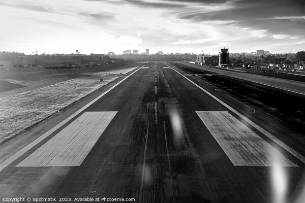 Aerial POV of aircraft landing on airport runway  Picture Board by Spotmatik 