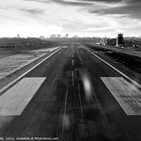 Buy canvas prints of Aerial POV of aircraft landing on airport runway  by Spotmatik 