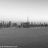 Buy canvas prints of Aerial Panoramic sunset of Dubai city skyscrapers by Spotmatik 