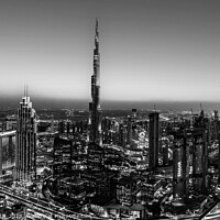 Buy canvas prints of Aerial Dubai sunset skyscrapers Burj Khalifa by Spotmatik 