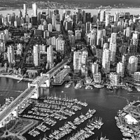 Buy canvas prints of Aerial Vancouver skyscrapers Burrard Street Bridge by Spotmatik 