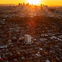 Buy canvas prints of Aerial skyline sunrise over Los Angeles California by Spotmatik 