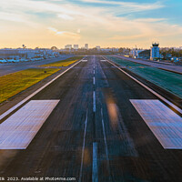 Buy canvas prints of Aerial POV aircraft landing on airport runway USA by Spotmatik 