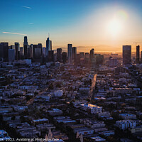 Buy canvas prints of Aerial sunrise view over Los Angeles city skyline  by Spotmatik 