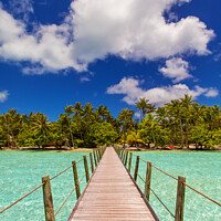 Buy canvas prints of Bora Bora Island jetty in luxury tropical resort by Spotmatik 