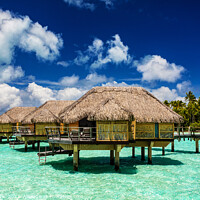 Buy canvas prints of Bora Bora luxury holiday resort with Overwater Bungalows  by Spotmatik 