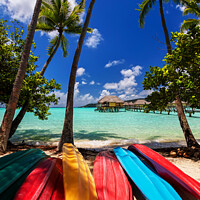 Buy canvas prints of kayaks Bora Bora active vacation luxury resort Polynesia by Spotmatik 