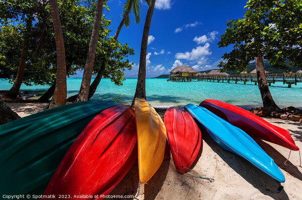 Tourist kayaks Bora Bora active vacation luxury resort  Picture Board by Spotmatik 
