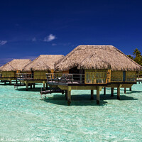 Buy canvas prints of Bora Bora luxury holiday resort with Overwater Bungalows  by Spotmatik 