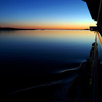 Buy canvas prints of Sunset Silhouette view from Cruise ship Norwegian Fjord  by Spotmatik 