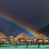 Buy canvas prints of Multicolored rainbow arch Bora Bora luxury Overwater bungalows  by Spotmatik 
