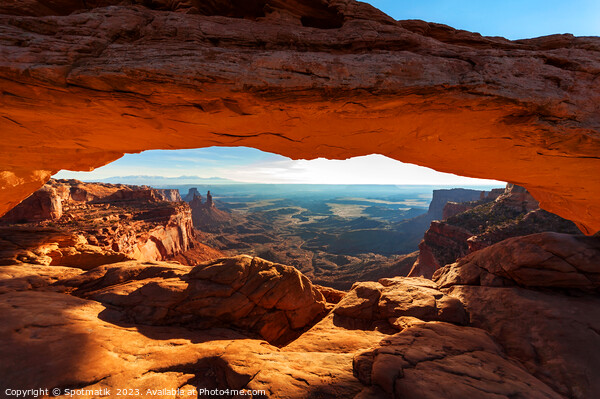 View of the rising sun Mesa sandstone Arch  Picture Board by Spotmatik 