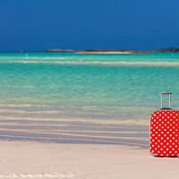 Buy canvas prints of Red polka dot travel suitcase on sand beach by Spotmatik 