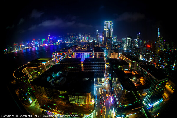 Hong Kong illuminated city traffic and skyscrapers downtown  Picture Board by Spotmatik 