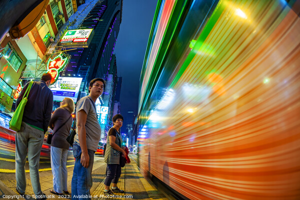 Hong Kong illuminated busy vehicle intersection Ko Picture Board by Spotmatik 