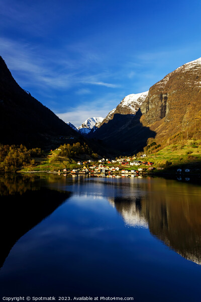 View of Norwegian small town in scenic valley  Picture Board by Spotmatik 