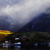 Buy canvas prints of Sunlight beaming though light mist Norwegian glacial fjord  by Spotmatik 
