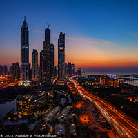 Buy canvas prints of Dubai sunset Sheikh Zayed Road Media city skyscrapers  by Spotmatik 
