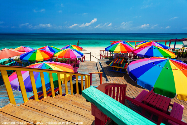 Beach umbrellas in the tropical sunshine Bahamas Caribbean Picture Board by Spotmatik 