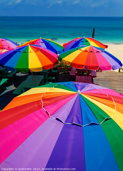 Colorful beach umbrellas in the tropical sunshine Caribbean Picture Board by Spotmatik 