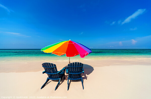 Parasol and chairs on sandy beach Bahamas Caribbean Picture Board by Spotmatik 