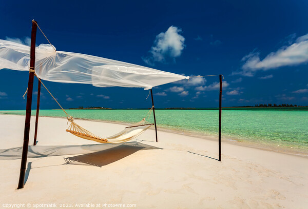 Hammock on the shoreline remote luxury paradise Island  Picture Board by Spotmatik 
